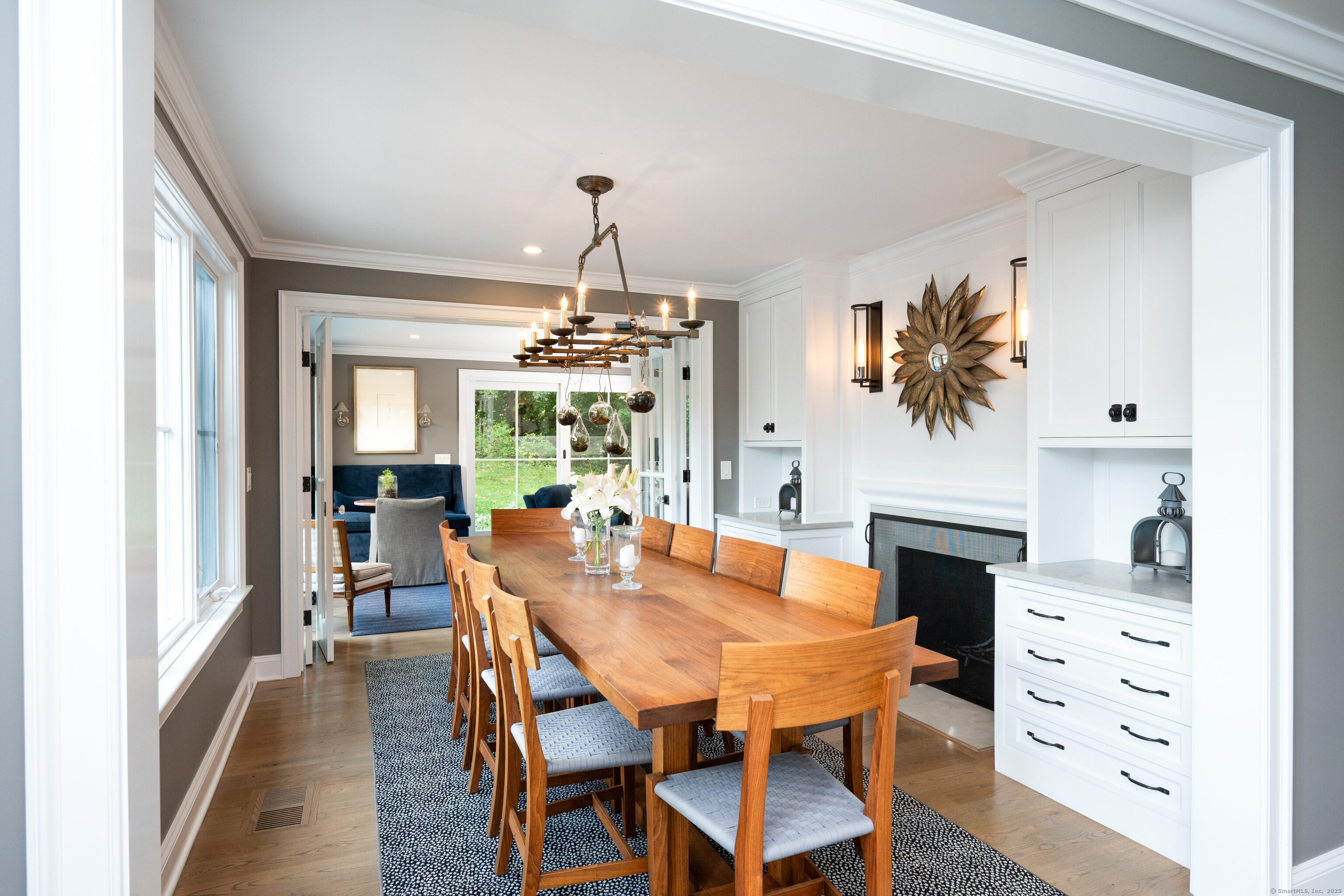 63 Dorchester Road Darien, CT 06820 - Photo 11 of 37 a dining room with furniture a chandelier and wooden floor