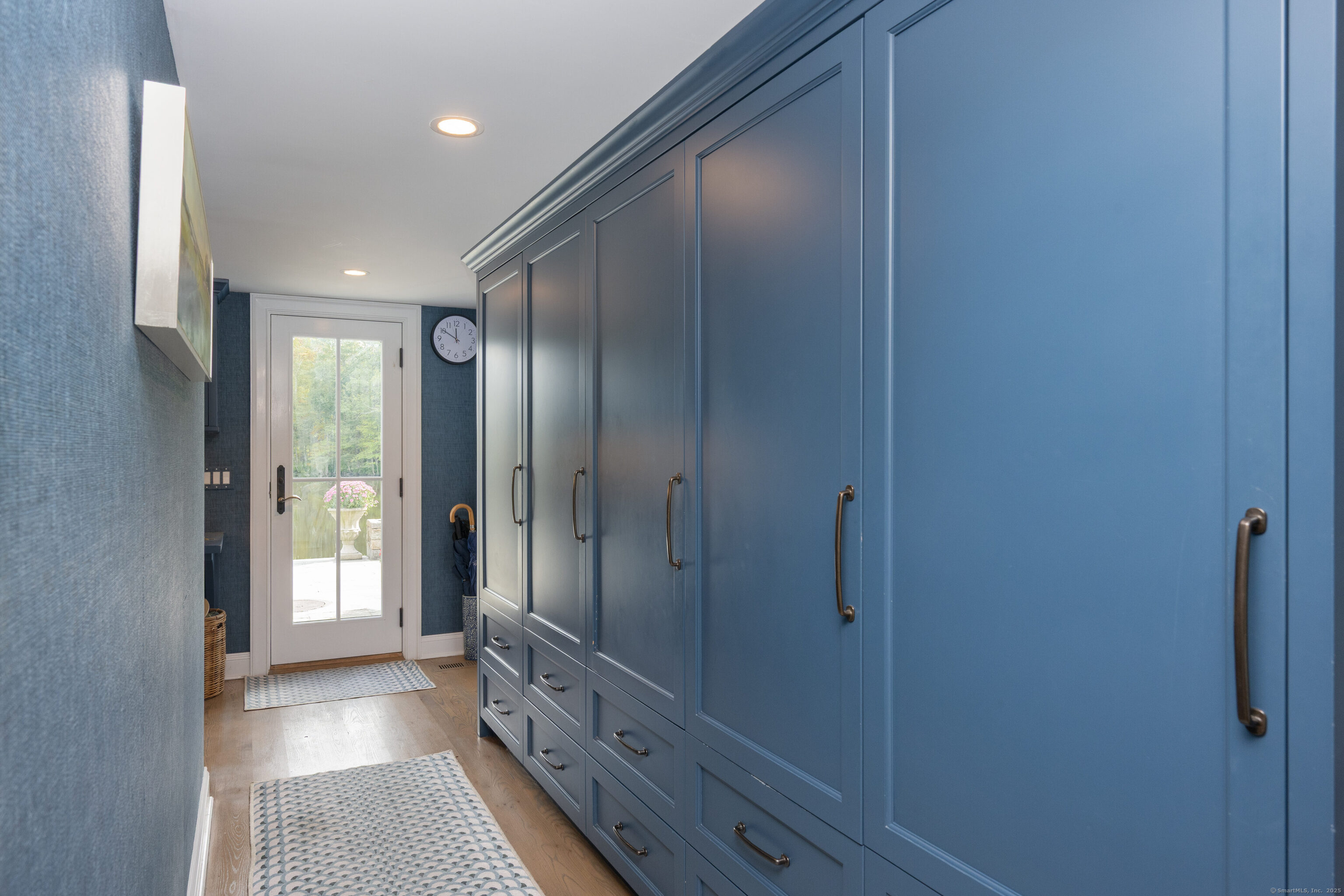 63 Dorchester Road Darien, CT 06820 - Photo 17 of 37 a bathroom with a glass door shower