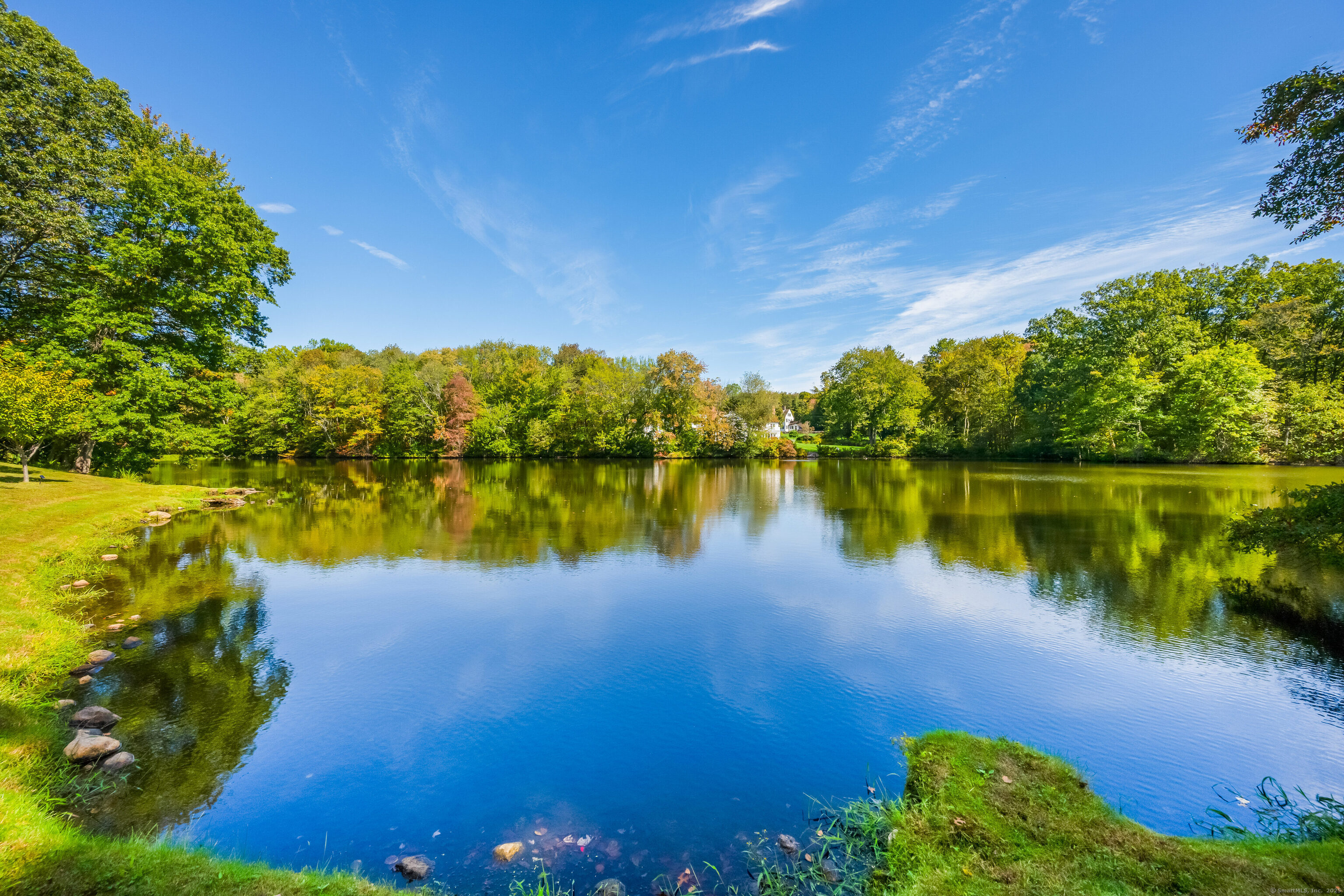 63 Dorchester Road Darien, CT 06820 - Photo 30 of 37 a view of a lake from a yard