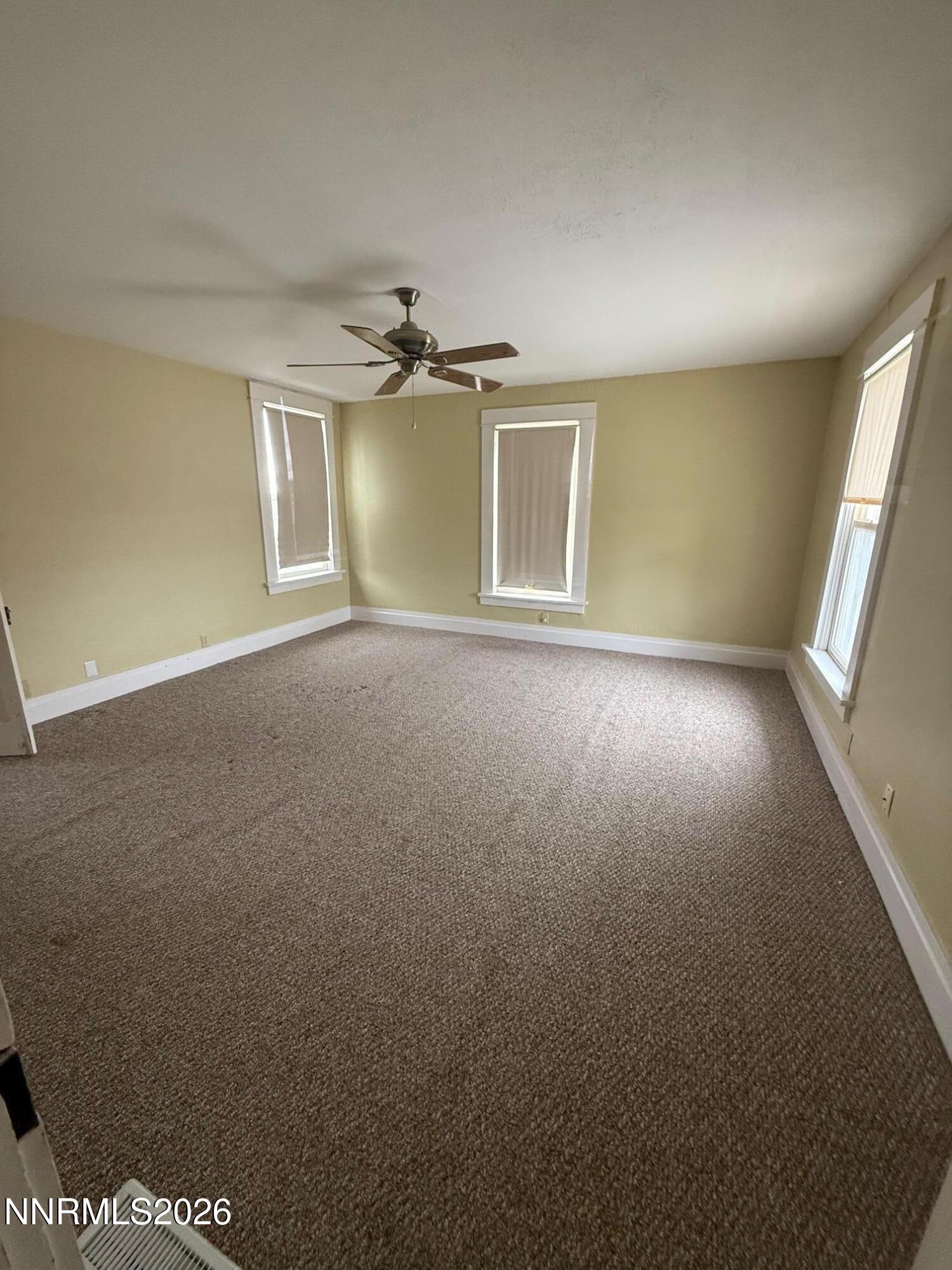2421 Harrigan Road Fallon, NV 89406 - Photo 14 of 17 a view of a room with an empty space and a window