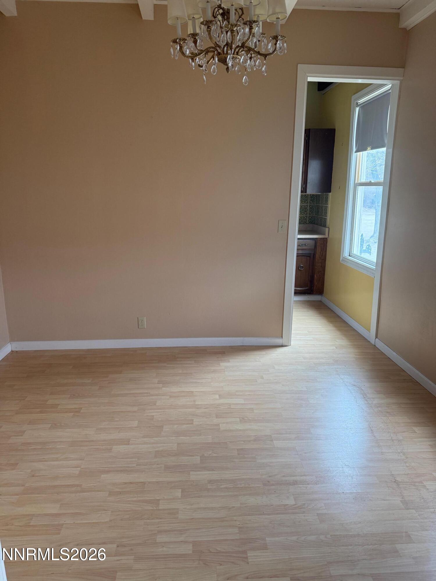 2421 Harrigan Road Fallon, NV 89406 - Photo 10 of 17 a view of a room with wooden floor