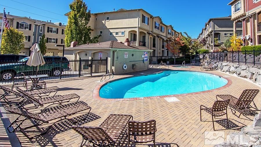 3214 Sterling Ridge Circle Sparks, NV 89431 - Photo 17 of 19 a view of a swimming pool with a patio