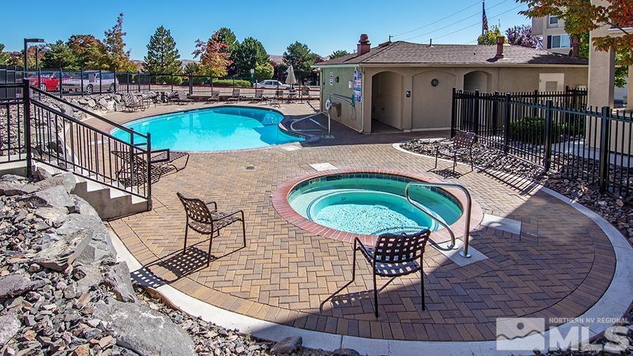 3214 Sterling Ridge Circle Sparks, NV 89431 - Photo 18 of 19 swimming pool view with a seating space