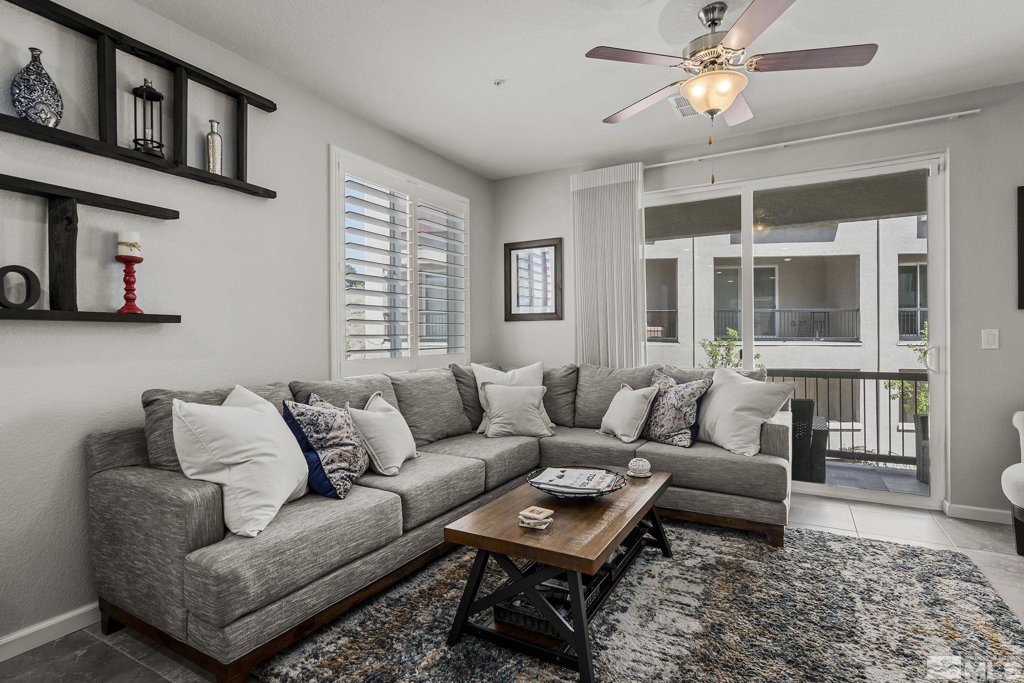 3214 Sterling Ridge Circle Sparks, NV 89431 - Photo 2 of 19 a living room with furniture and a window