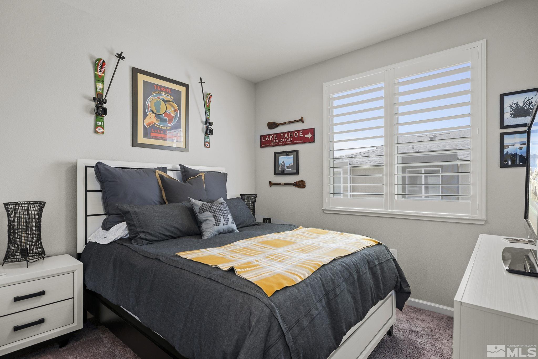 3214 Sterling Ridge Circle Sparks, NV 89431 - Photo 10 of 19 a bedroom with bed and a window