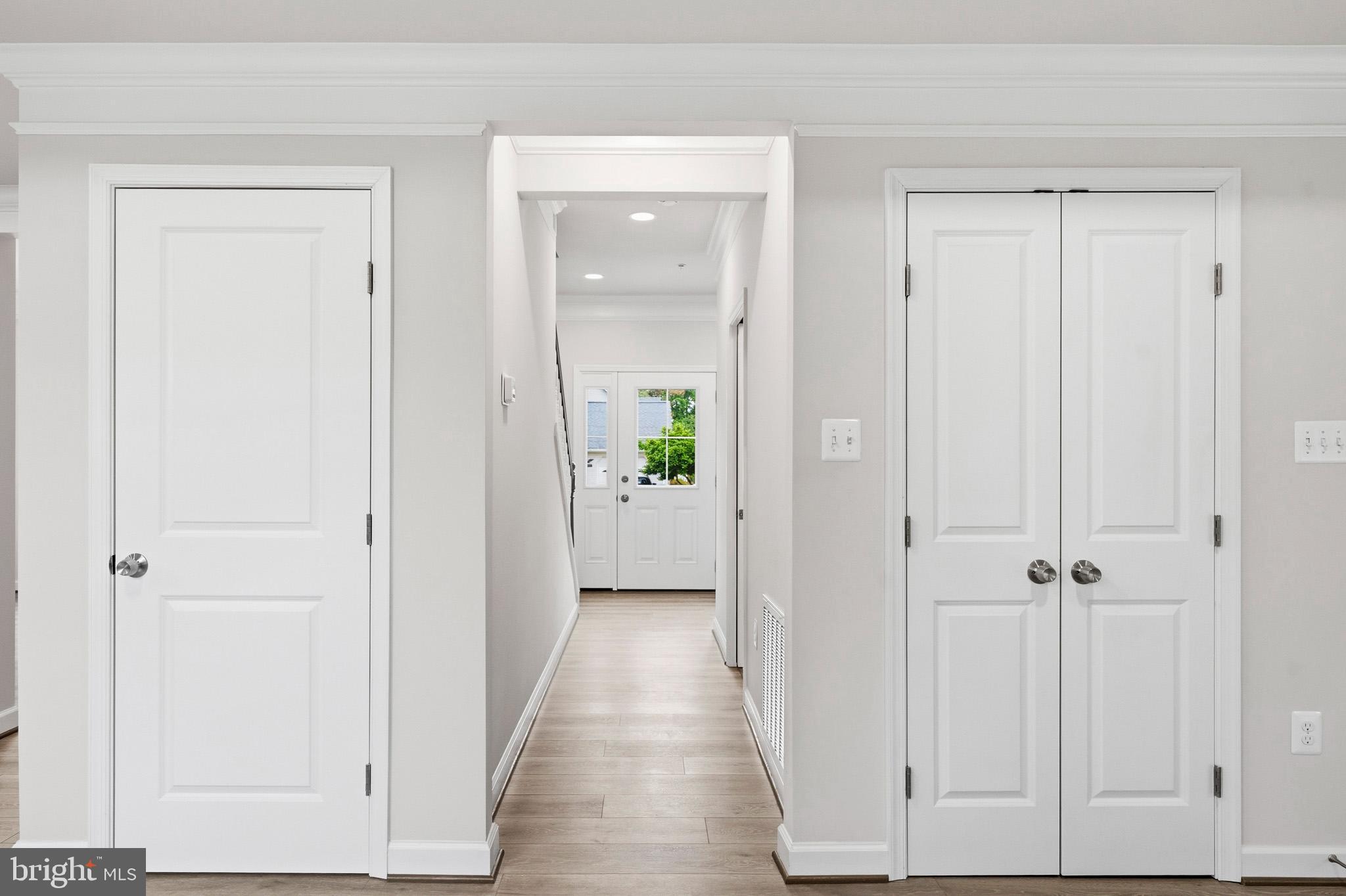 29725 Bruce Road Mechanicsville, MD 20659 - Photo 36 of 79 a view of a hallway with wooden floor and closet area