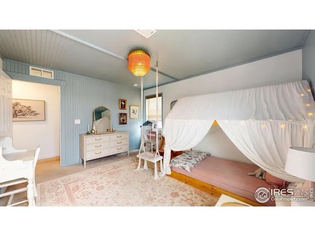 a living room with a couch and a table