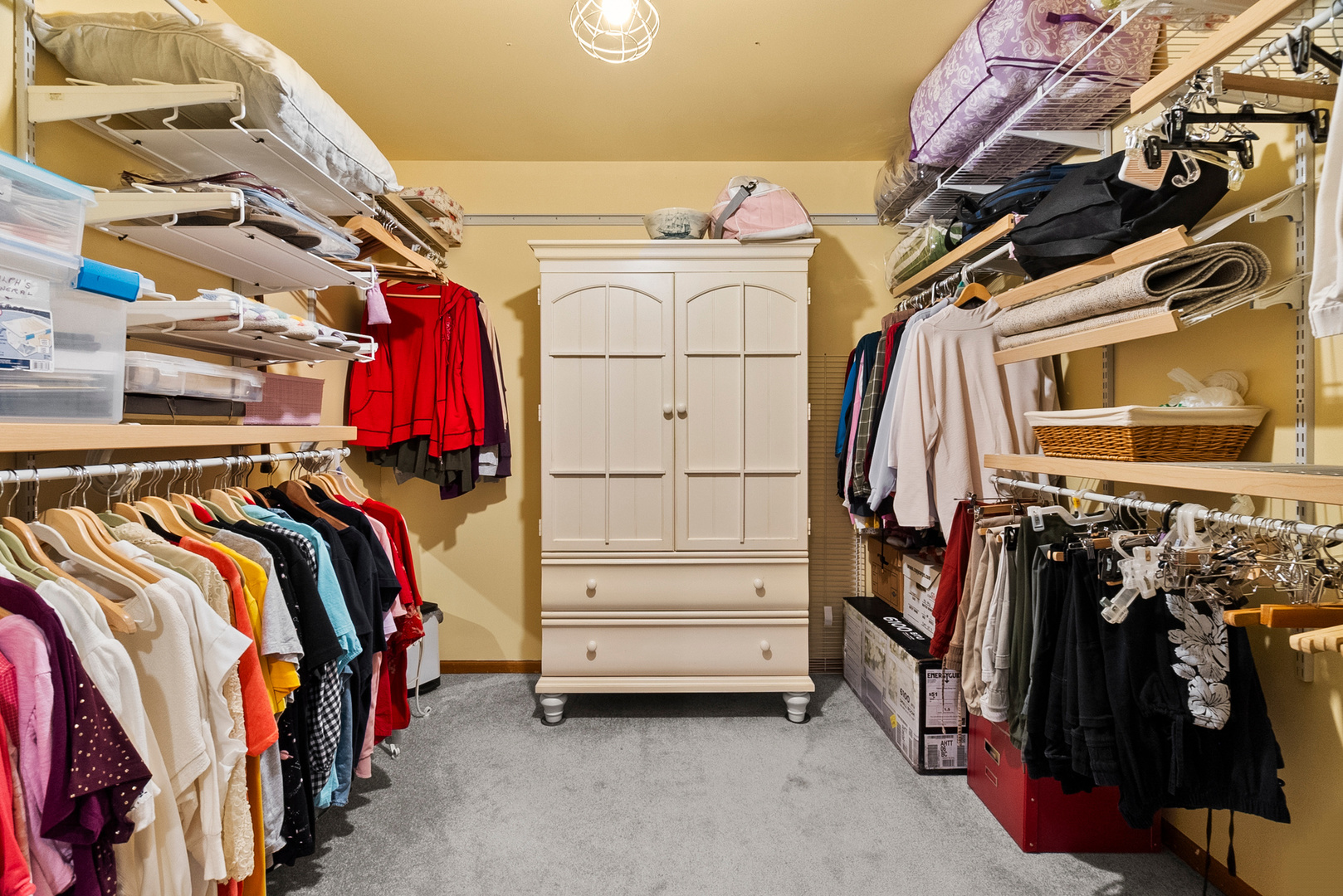 11130 Granite Drive Mokena, IL 60448 - Photo 15 of 41 a view of walk in closet with clothes and shoes