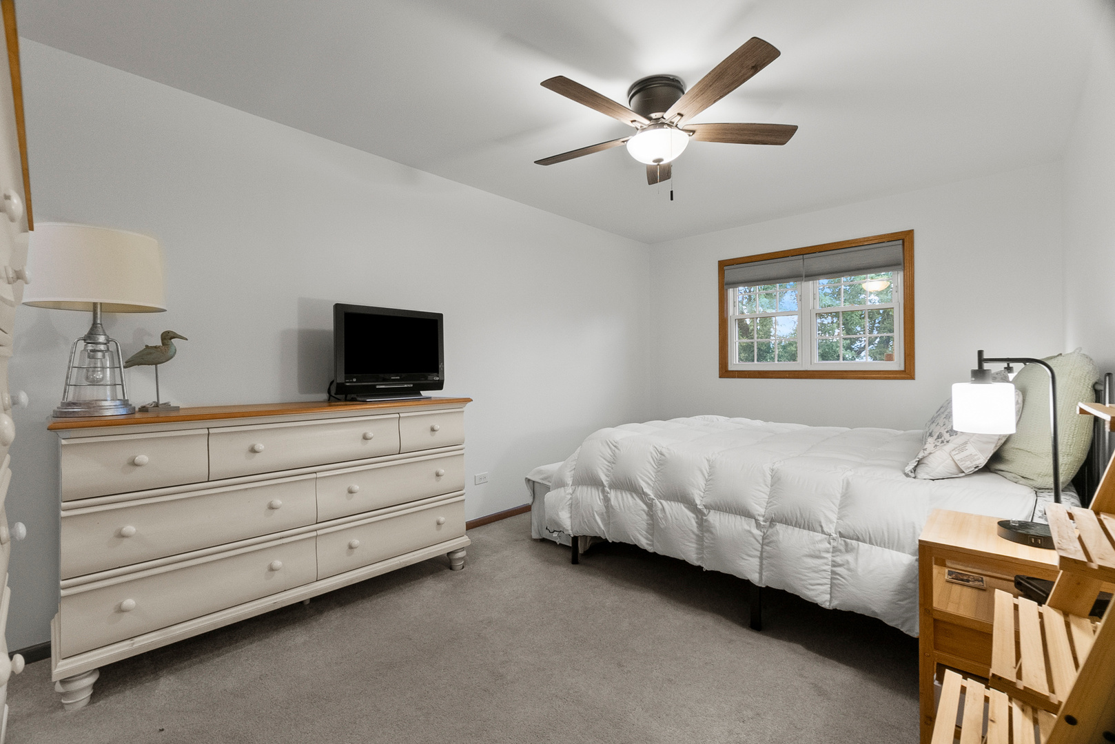 11130 Granite Drive Mokena, IL 60448 - Photo 18 of 41 a bedroom with a bed and a flat screen tv