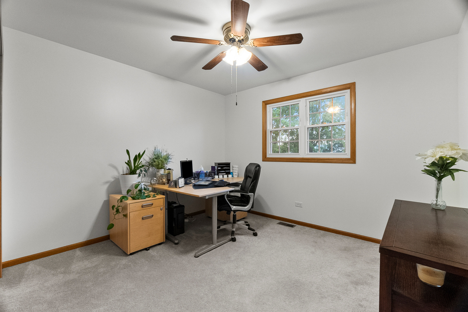 11130 Granite Drive Mokena, IL 60448 - Photo 23 of 41 a view of a workspace with furniture and a window