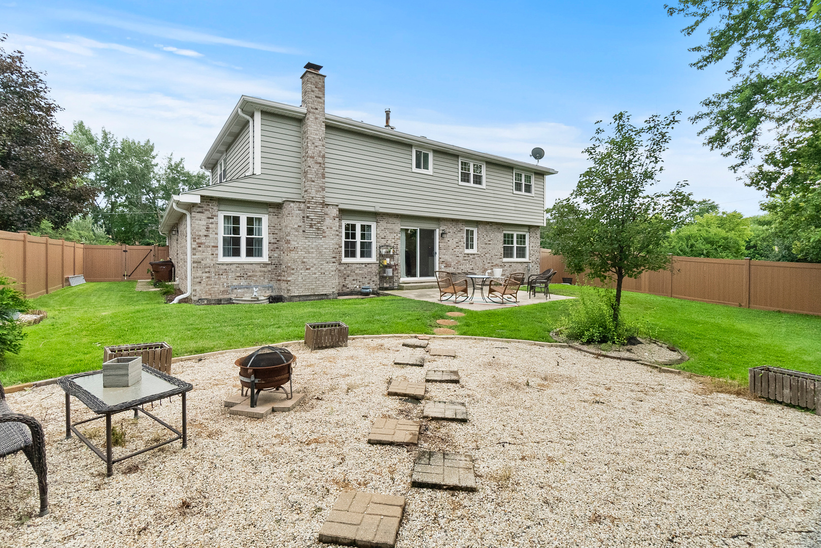 11130 Granite Drive Mokena, IL 60448 - Photo 27 of 41 a front view of house with yard and green space