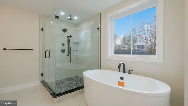 a close view of a bathroom sink and window