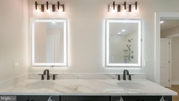 a bathroom with a sink and a window