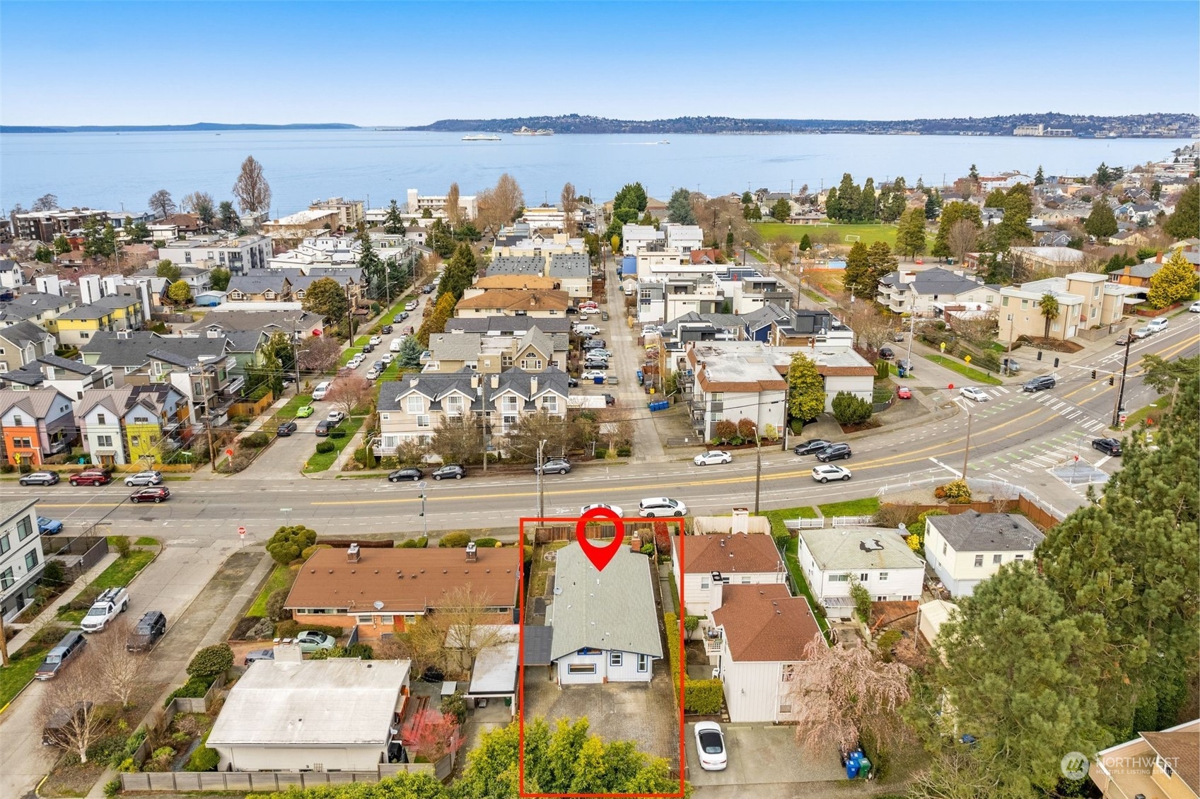 an aerial view of residential building and parking space