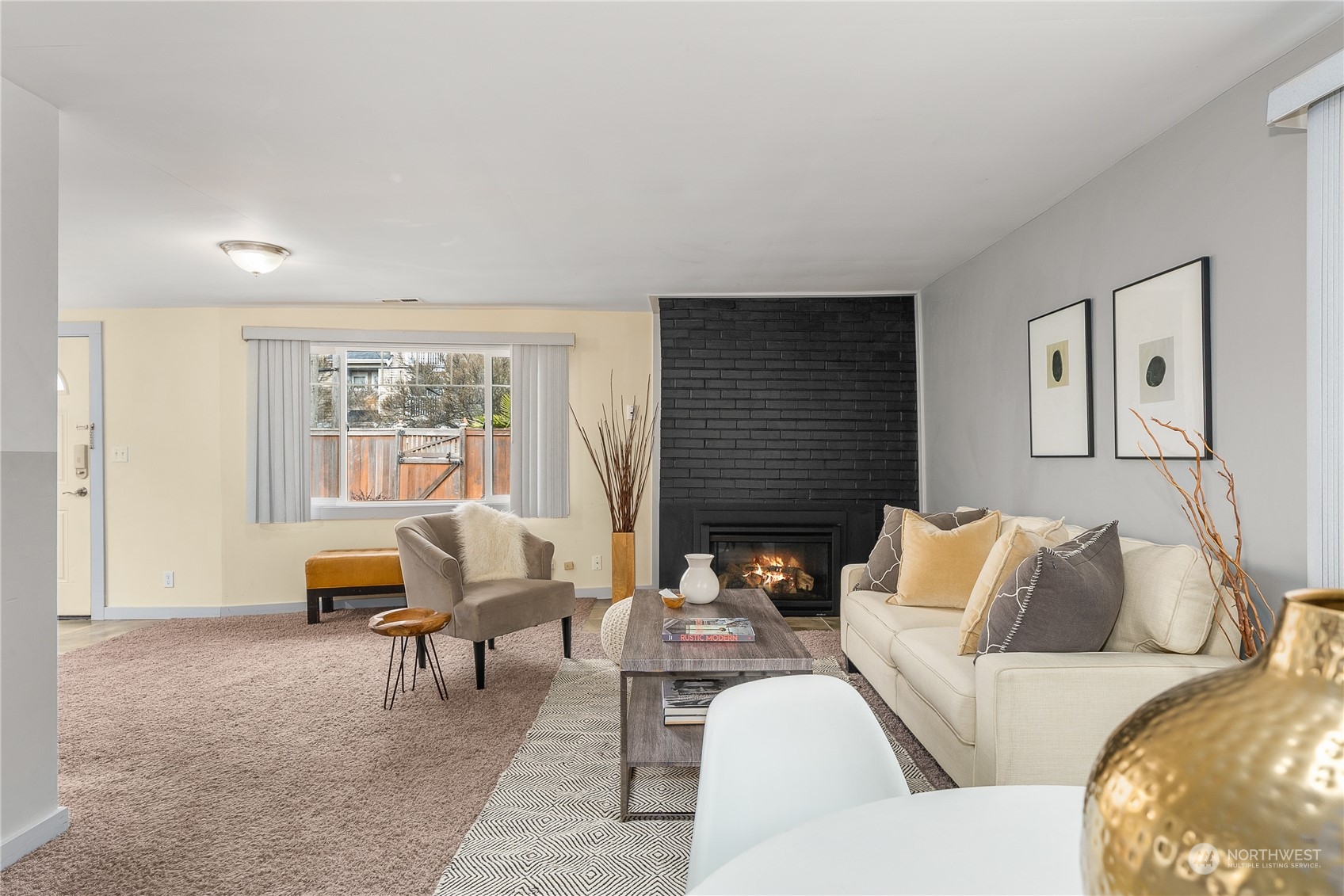 5915 Southwest Admiral Way Seattle, WA 98116 - Photo 11 of 31 a living room with furniture and a lamp