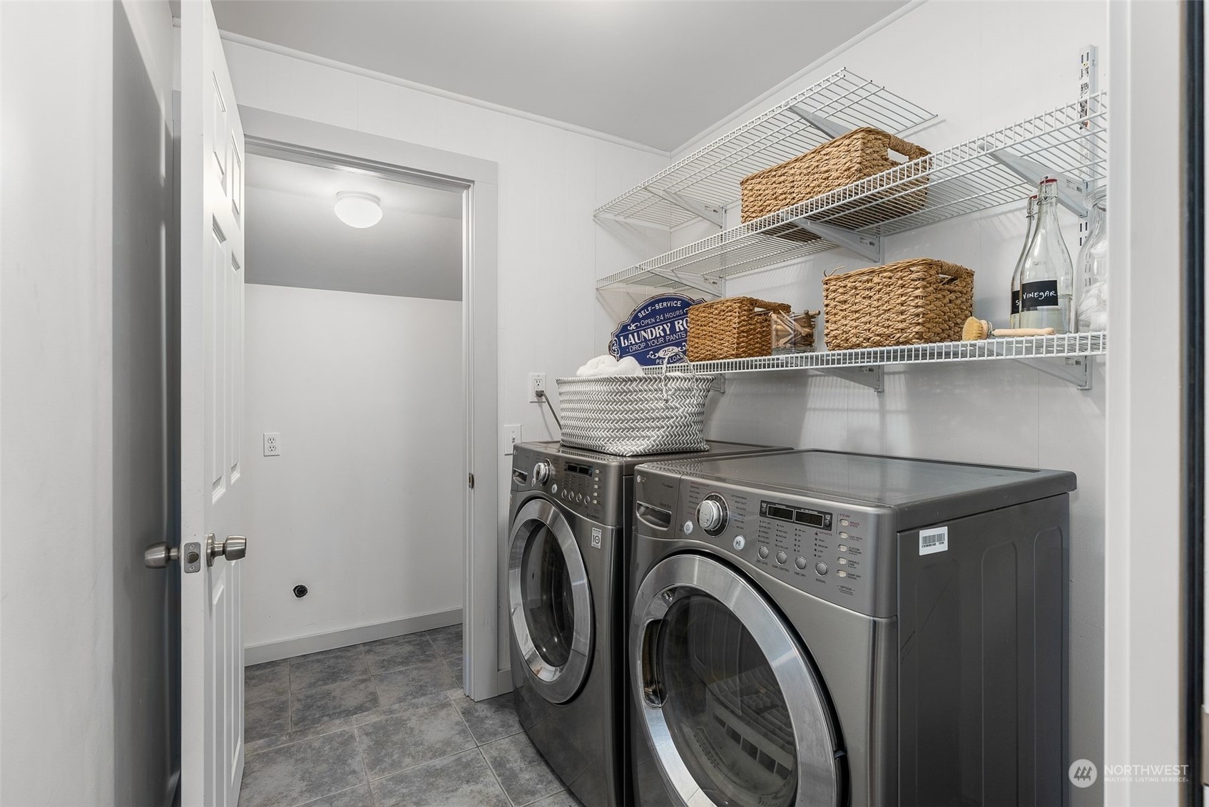 5915 Southwest Admiral Way Seattle, WA 98116 - Photo 23 of 31 a view of washer and dryer