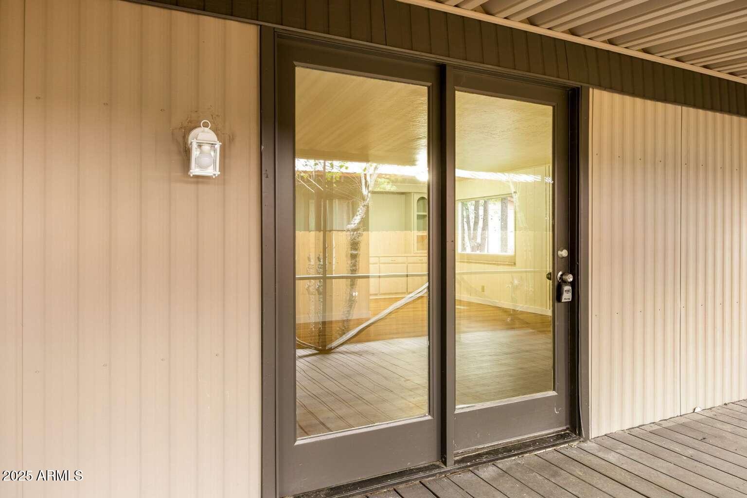 5369 North Blue Ridge Loop, Unit S Pinetop, AZ 85935 - Photo 5 of 33 a view of a bathroom with a glass door