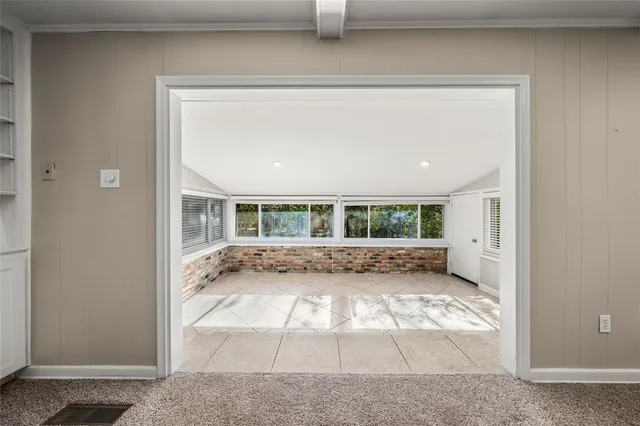 a view of backyard with green space