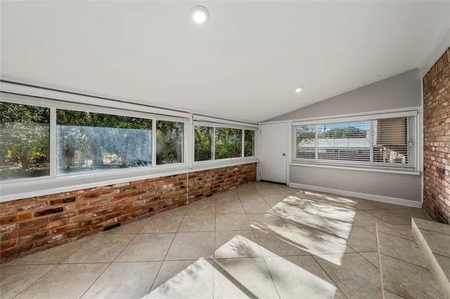 a view of backyard with green space