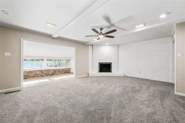 a view of a kitchen with a stove cabinets and a fireplace
