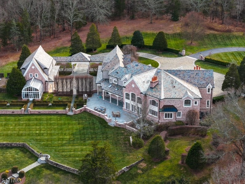 581 Pottersville Road Bedminster, NJ 07931 - Photo 46 of 50 a aerial view of a house with swimming pool and a yard