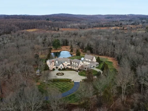aerial view of a house with a garden