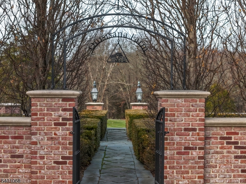 581 Pottersville Road Bedminster, NJ 07931 - Photo 50 of 50 a brick building with a lots of trees in front of it