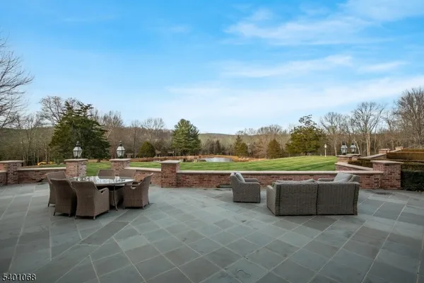 a view of a couches in the roof yard
