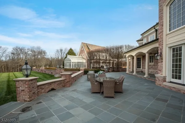 a view of a terrace with sitting area