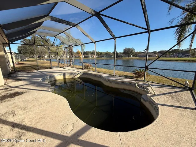a view of a backyard of a house