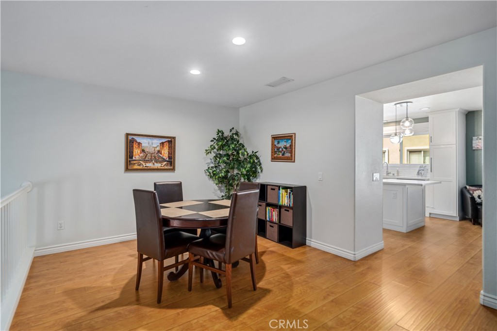 25710 Wagner Way, Unit C Stevenson Ranch, CA 91381 - Photo 12 of 37 a dining room with furniture and window