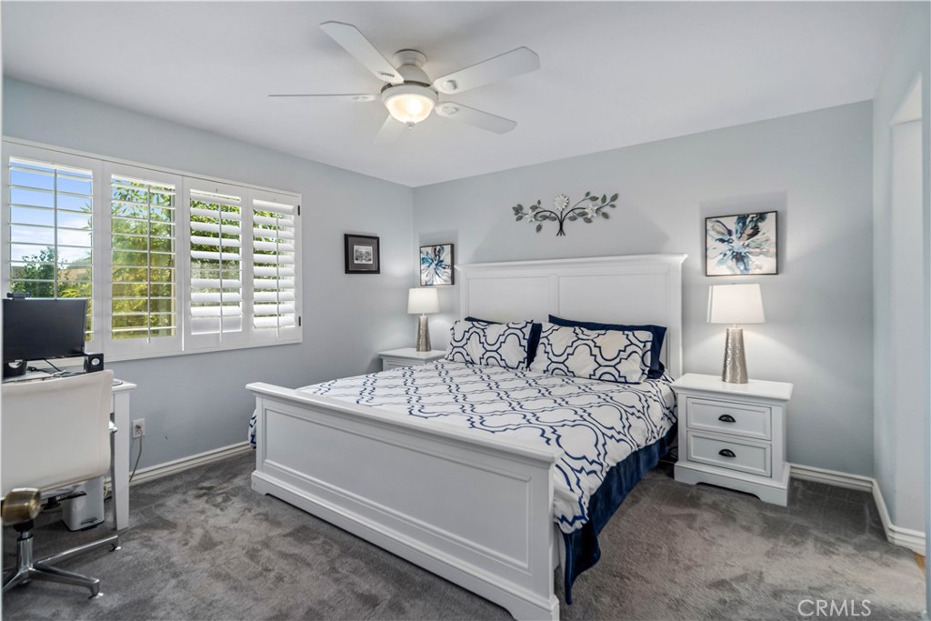25710 Wagner Way, Unit C Stevenson Ranch, CA 91381 - Photo 20 of 37 a bedroom with a bed and a window