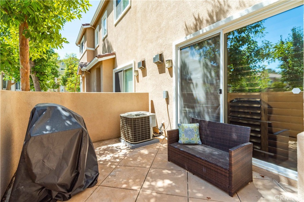 25710 Wagner Way, Unit C Stevenson Ranch, CA 91381 - Photo 29 of 37 a view of a couches in the patio