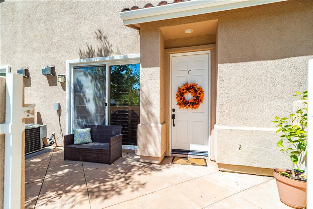 25710 Wagner Way, Unit C Stevenson Ranch, CA 91381 - Photo 4 of 37 a view of a entryway door front of house