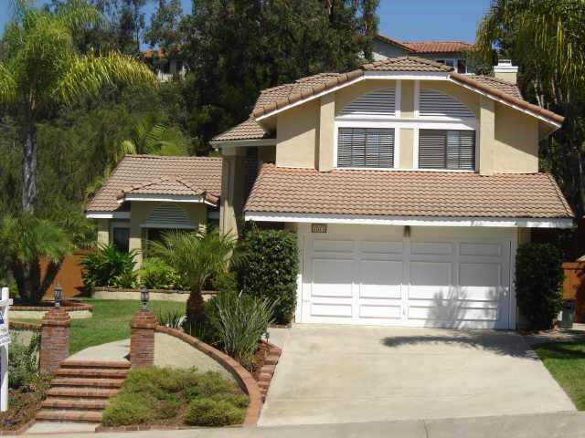 1575 Village View Road Encinitas, CA 92024 - Photo 1 of 1 a front view of a house with a yard and garage