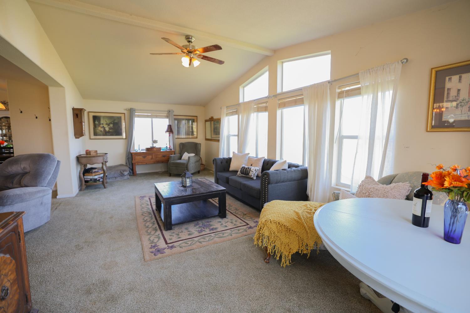 124 Wyer Road Arbuckle, CA 95912 - Photo 12 of 43 a living room with furniture and a large window