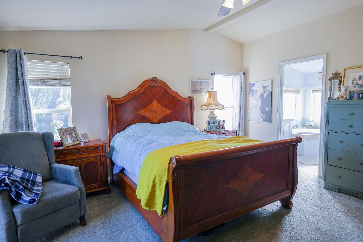 124 Wyer Road Arbuckle, CA 95912 - Photo 16 of 43 a bedroom with a bed and a dresser