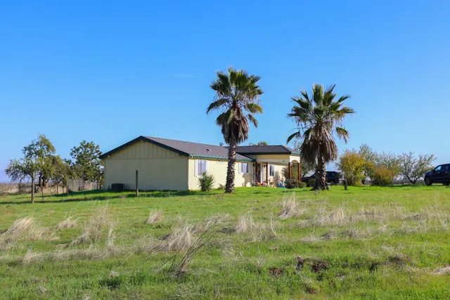 a view of a road with ocean view