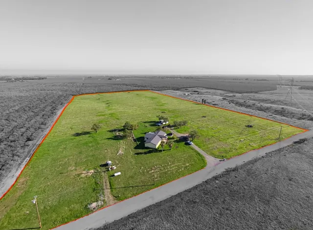 a view of a swimming pool with an outdoor seating