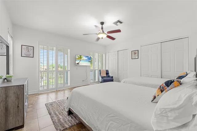 a bathroom with a granite countertop sink mirror and double
