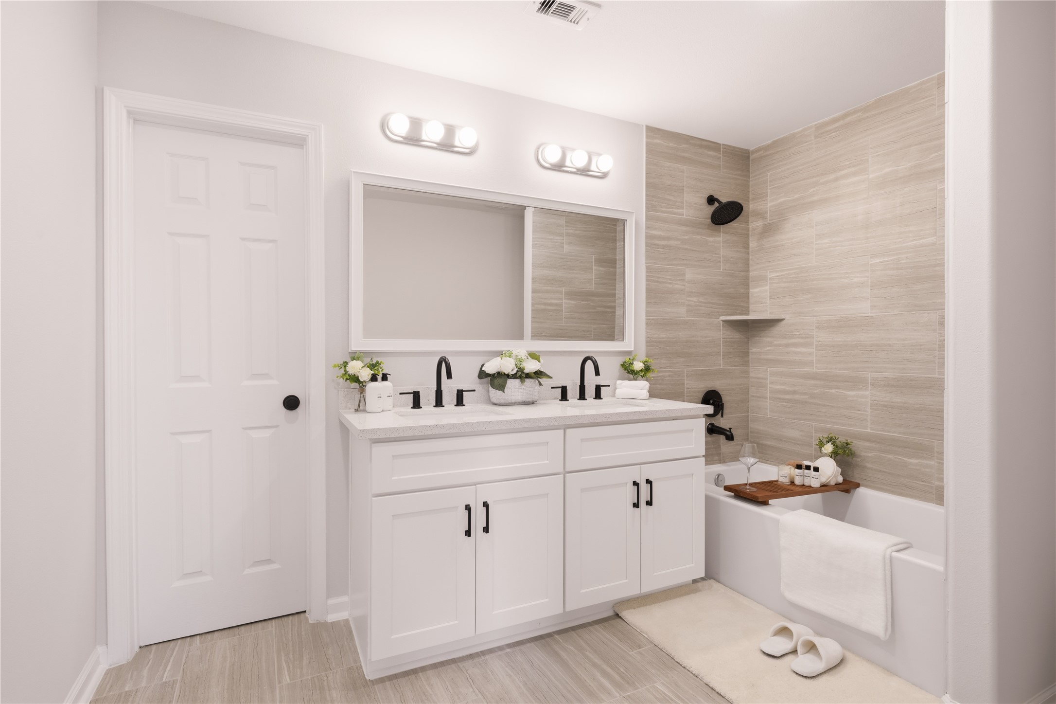 5915 Haight Street, Unit A Houston, TX 77028 - Photo 20 of 21 a spacious bathroom with a bathtub sink and mirror
