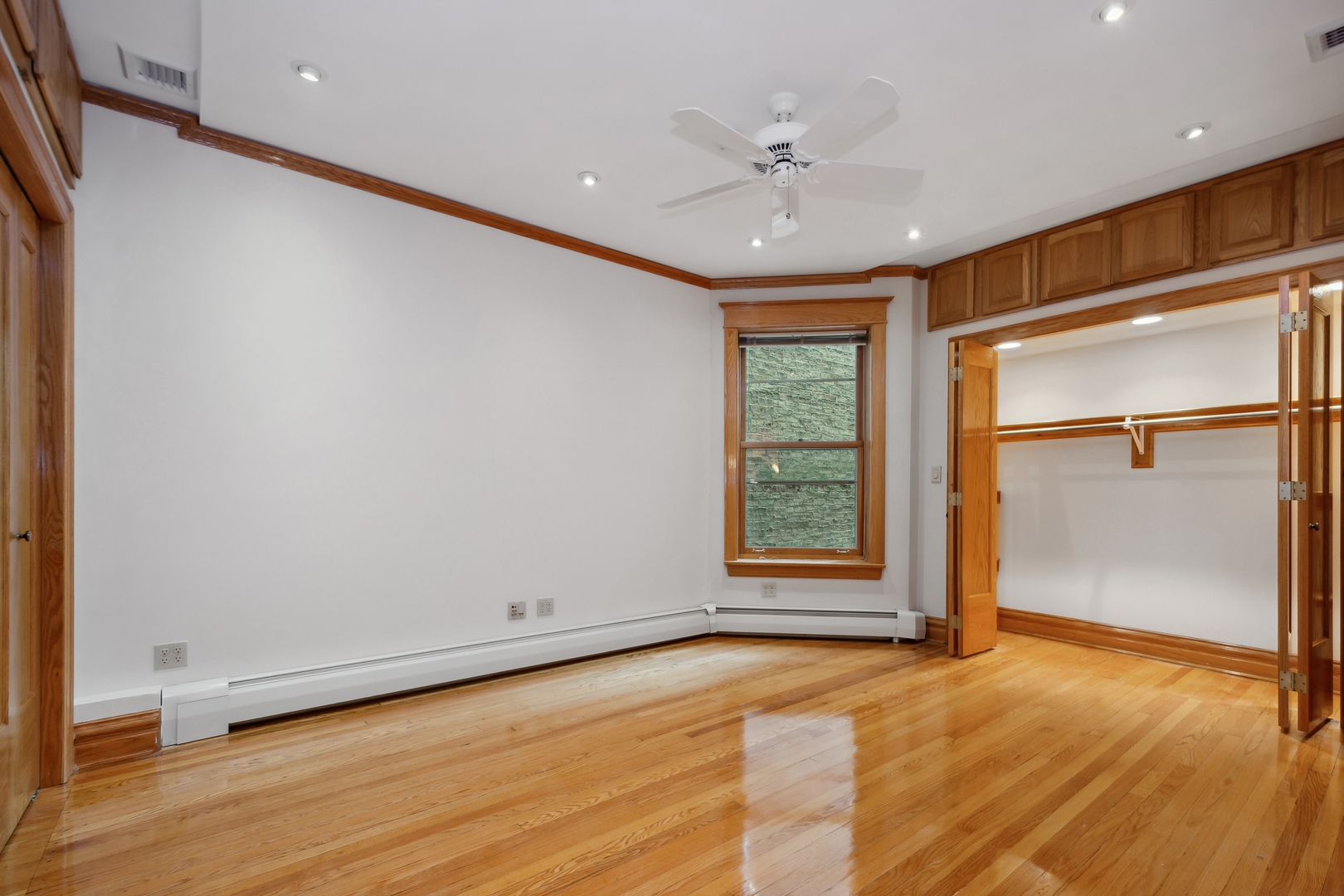 3631 North Sheffield Avenue, Unit 2 Chicago, IL 60613 - Photo 12 of 23 a view of an empty room with a window