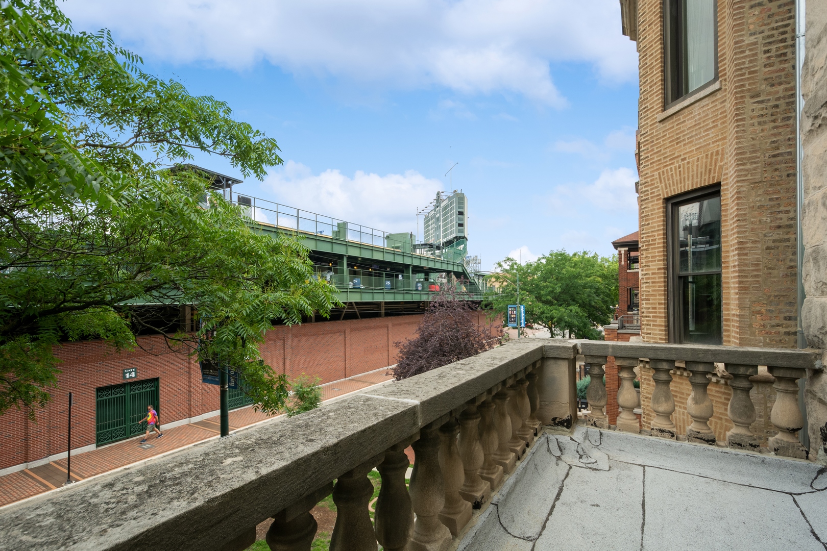 3631 North Sheffield Avenue, Unit 2 Chicago, IL 60613 - Photo 20 of 23 a balcony with view of trees