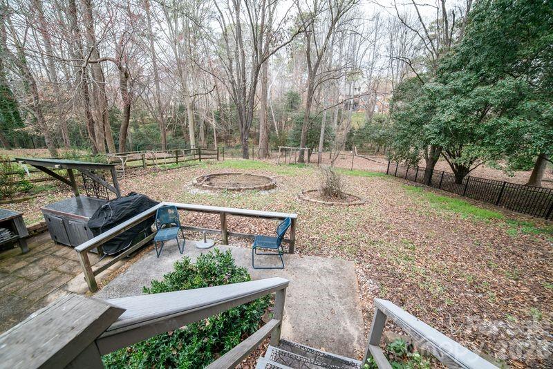 40 Old Field Road Taylorsville, NC 28681 - Photo 28 of 30 a view of a backyard with wooden fence