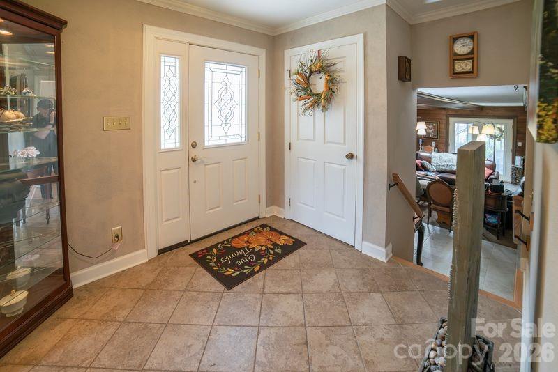 40 Old Field Road Taylorsville, NC 28681 - Photo 7 of 30 a view of a hallway and a livingroom with wooden floor