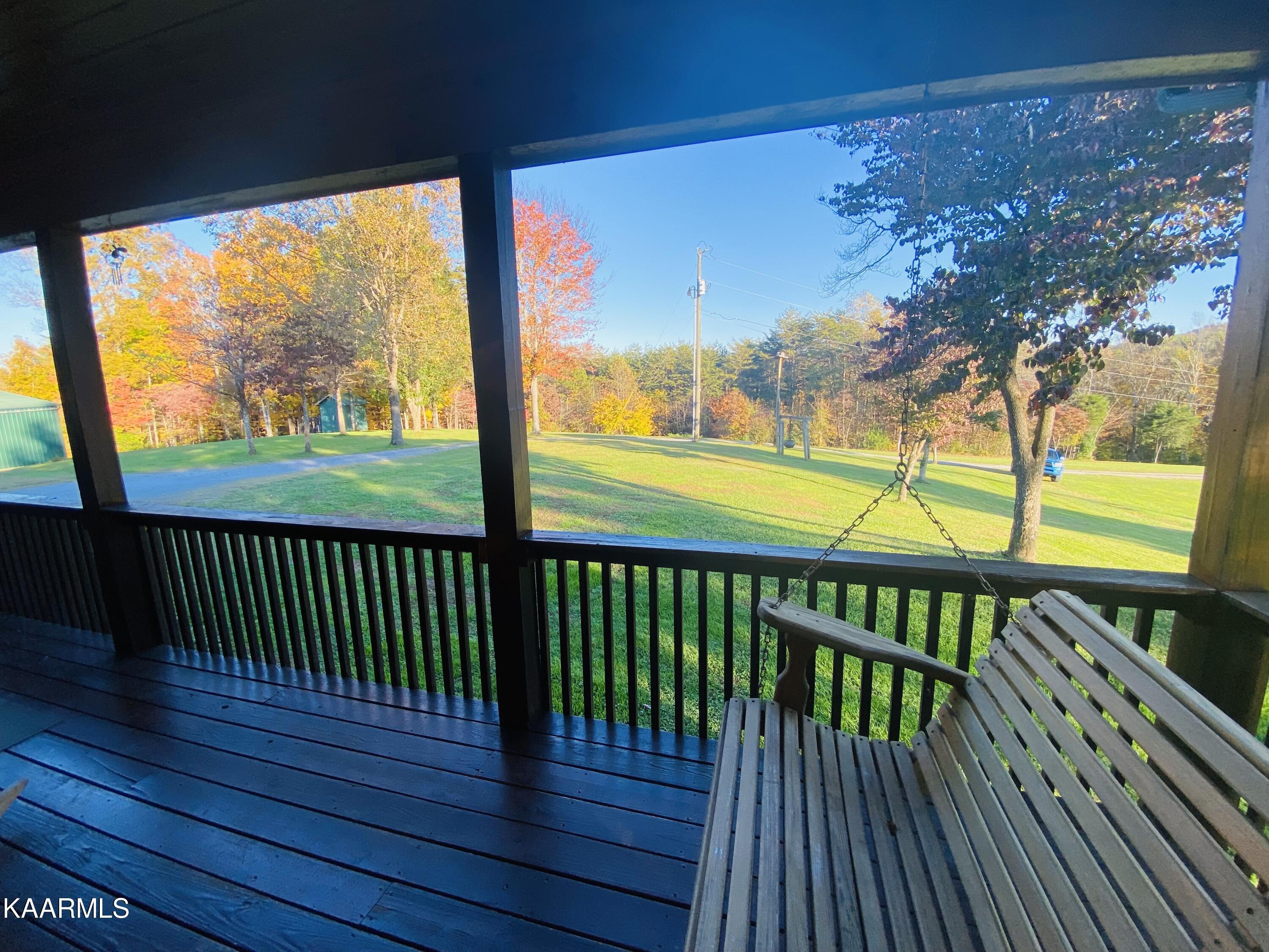 140 Dye Road Madisonville, TN 37354 - Photo 5 of 36 Front deck and yard