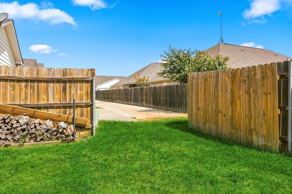 236 Firefly Drive Springtown, TX 76082 - Photo 21 of 24 Gate to Backyard
