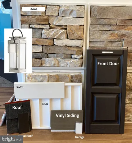 a black and white building with a sign on top