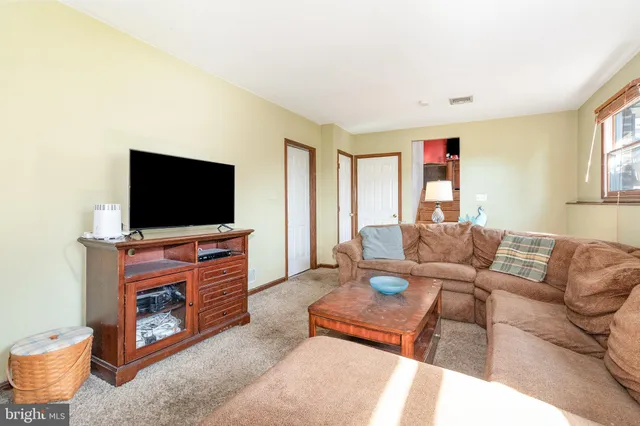 a room with furniture a desk and chair