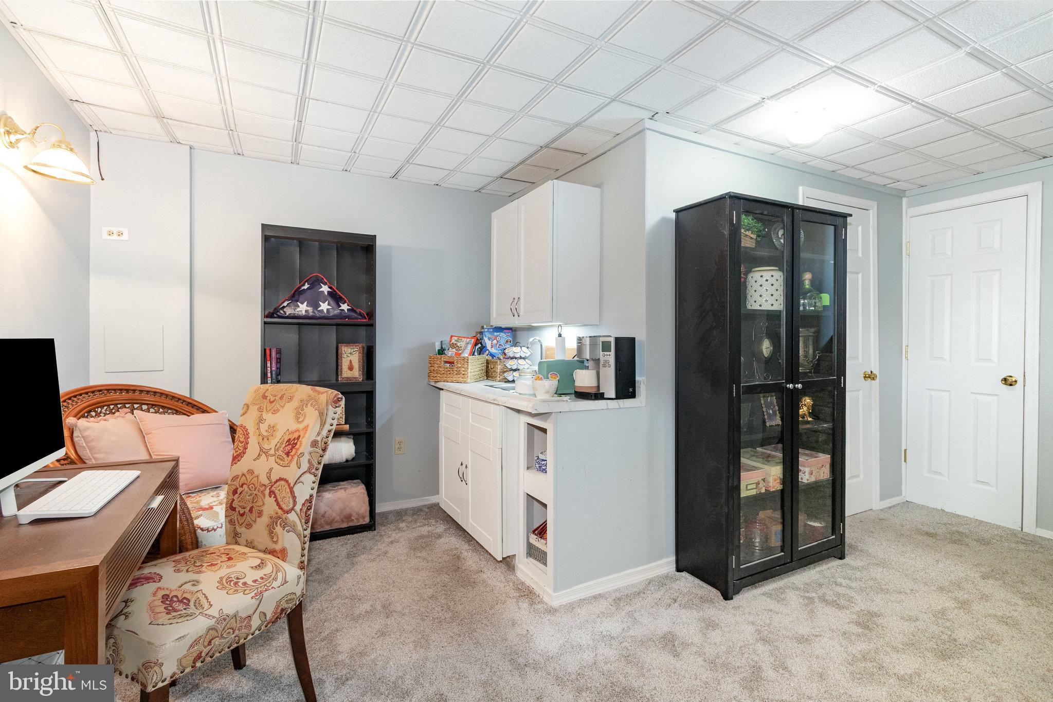 6418 Taunton Road Harrisburg, PA 17111 - Photo 22 of 39 a room with furniture a desk and chair